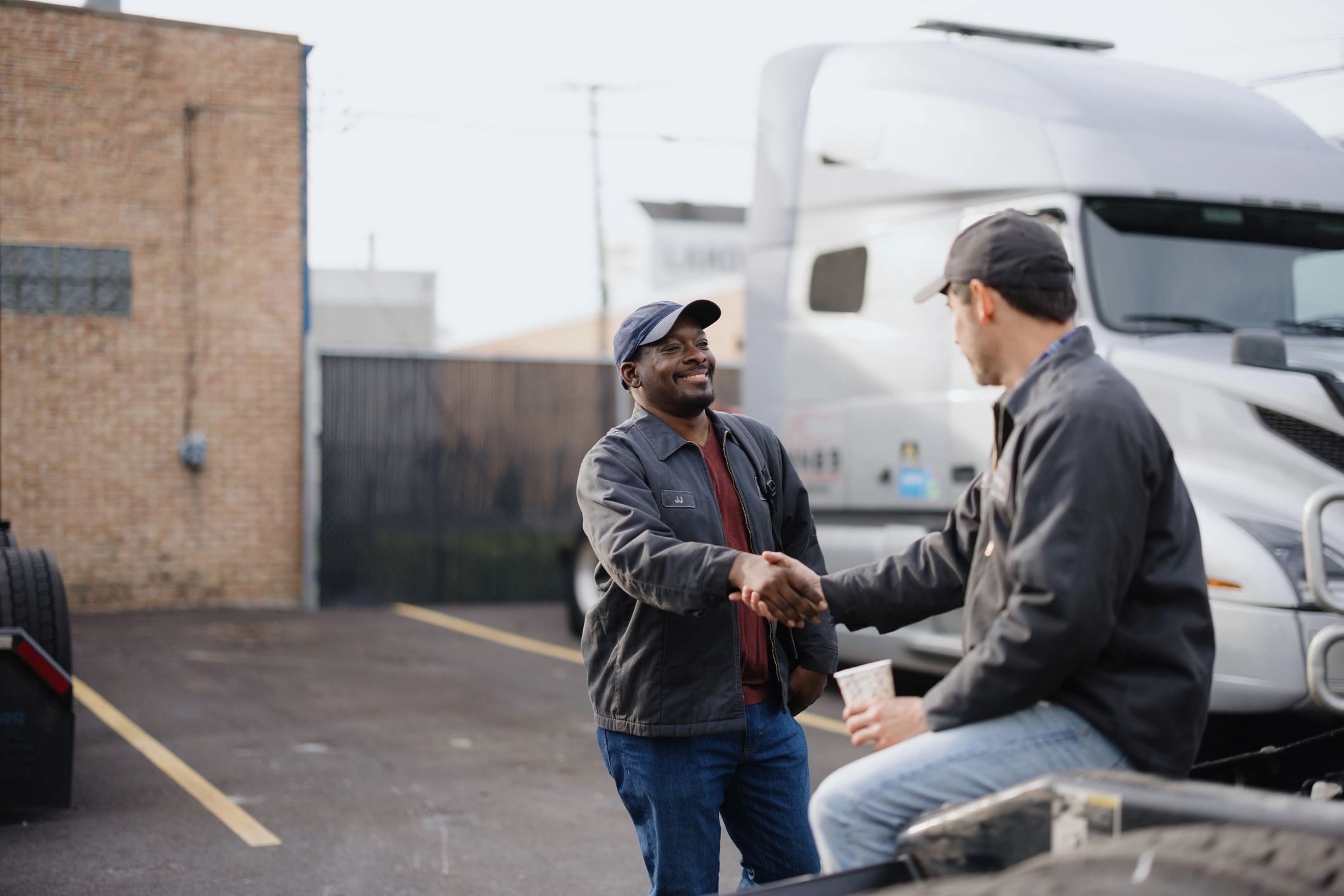 Homeowner meeting a service professional for an estimate